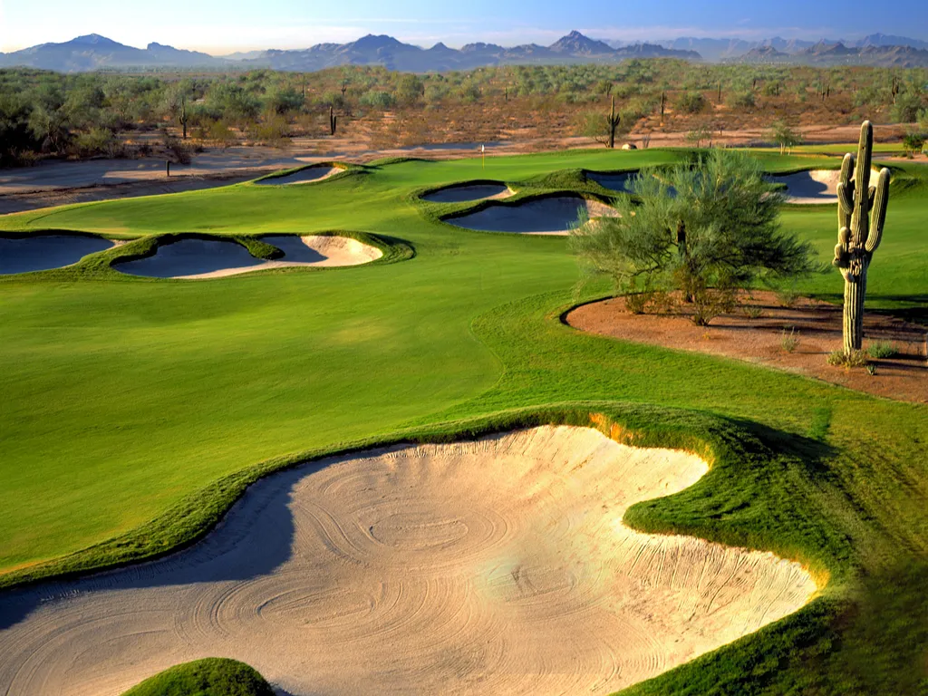 Desert Ridge golf fairway with bunkers, cactus, and mountain views